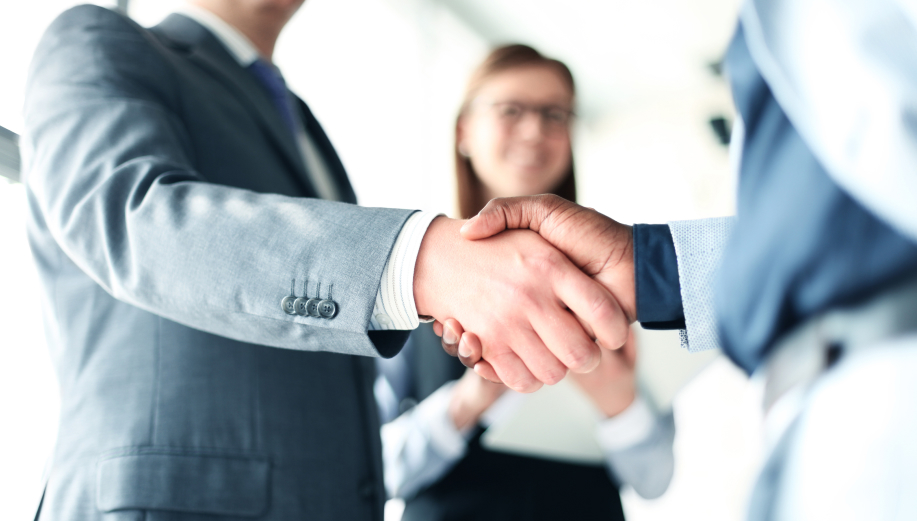 attorney and client handshake